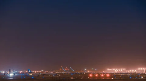 Timelapse. Light Trails of Aircrafts Taking-off and Landing at Runway, Beijing. Video stock 62564725