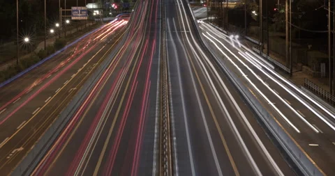 TimeLapse - Light trails on motorway highway at night, Long exposure Zoom-in. Stock Footage 160291032