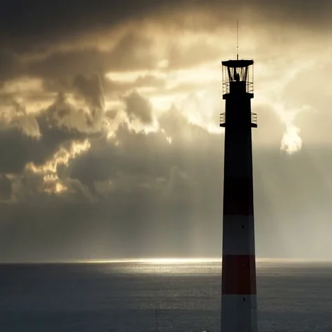 Timelapse lighthouse on the sea under stormy clouds and with the ship in the Stock-Footage 69538160