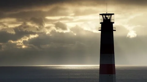 Timelapse lighthouse on the sea under stormy clouds and with the ship in the Видео 70658443