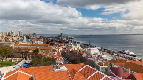 Timelapse of the Lisbon cargo seaport with rooftops. Portugal. April, 2017 스톡 동영상 78518521