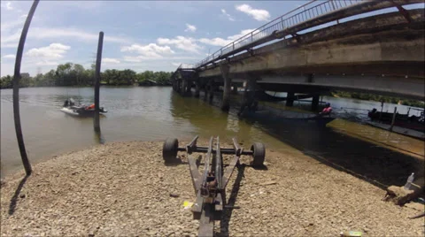 Timelapse of Loading boat on a ramp and towing on road Stock Footage 32550371