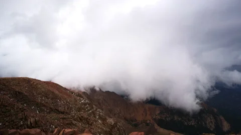 Timelapse Lockdown Of Storm Clouds Quickly Covering A Rugged Mountain Landscape Stock Footage 236996101