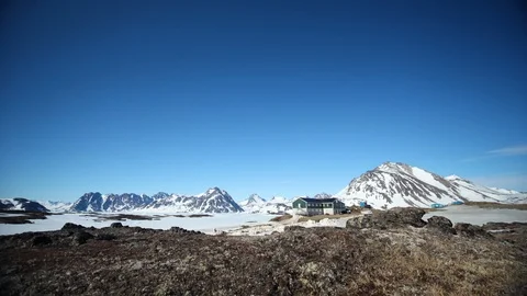 Timelapse of lonely house sitting in middle of nowhere in mountains on sunny day Stock Footage 124239470