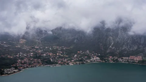 Timelapse looking down over the beautiful bay of kotor and Risan town Stock Footage 88160034