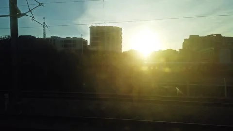 Timelapse of looking out the window from a high-speed train in a morning Stock Footage 248342527