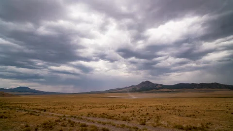 Timelapse looking through the dry Utah desert as wind blows dust Stock Footage 342741105