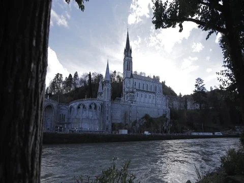 Timelapse of Lourdes cathedral from riverside Stock Footage 75263427