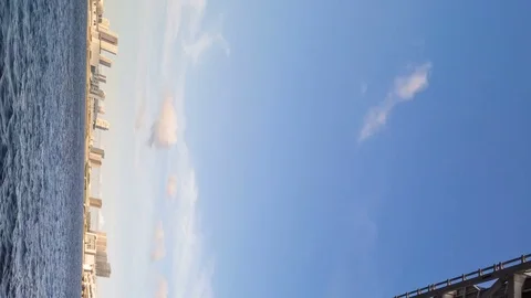 Timelapse Low Angle Shot under Rainbow Bridge at Port of Tokyo -Vertical/Pan- Stock Footage