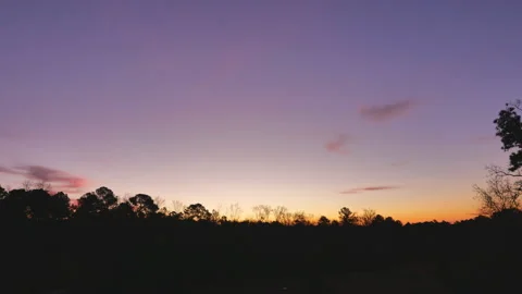 Timelapse, low angle, a winter sunrise over North Carolina, USA Video stock 140538559
