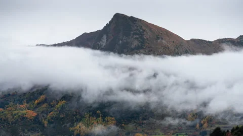 Timelapse of low clods and beautiful peak in the Pyrenees and autumn colours  Stock Footage 164572251