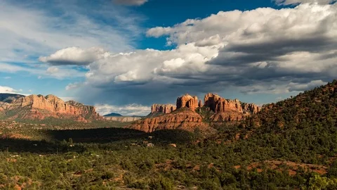 Timelapse of low clouds forming over landscape &amp; Cathedral Rock in Sedona, AZ. Video stock 80815718