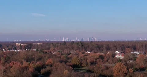Timelapse low flight over field rising to reveal Frankfurt skyline behind f.. Stock Footage 321704264