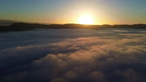 Timelapse of Low Hanging Clouds at Sunset 4k Drone Stock Footage 294098065