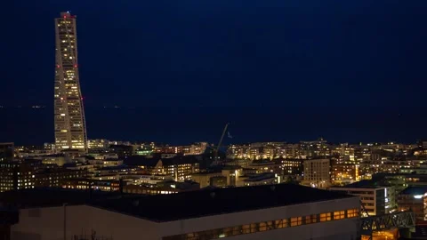 Timelapse of Malmo's Vibrant Night Cityscape Overlooking Oresund Strait Video stock 308199527