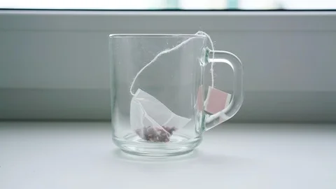 Timelapse man brews tasty raspberry tea in glass cup Video stock 118130076