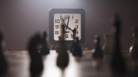 Timelapse. A man playing chess on chessboard in a dimly lit room Stock Footage 312816079