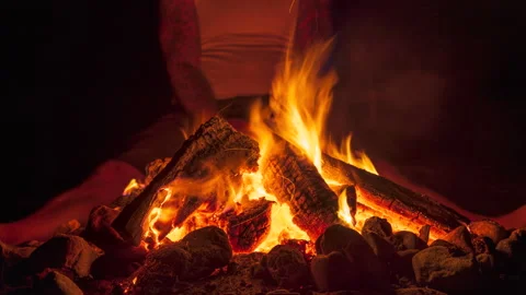 Timelapse Man Relaxing in front of Campfire Stock Footage 160071965