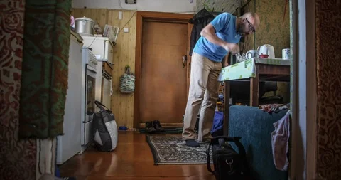 Timelapse of a man who does what in a small rural room Stock-Footage 129574380