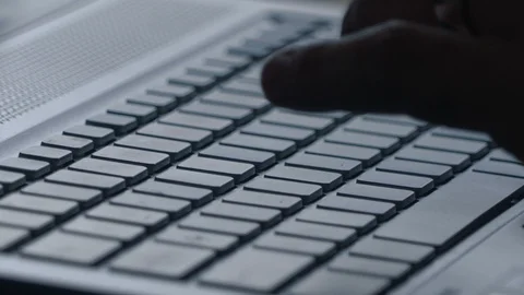 Timelapse of mans hands typing on laptop keyboard showing productivity CU Stock Footage 113748856