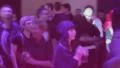 Timelapse of many young people hanging out at night club, motion HD Footage
