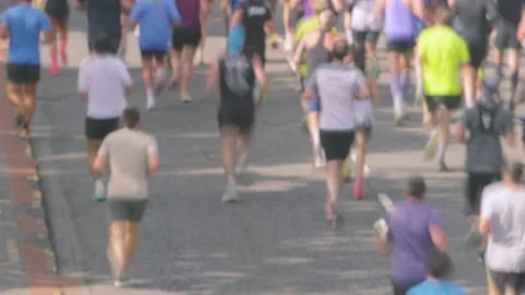 Timelapse of Marathon Runners in Race on Road Stock Footage 346567896