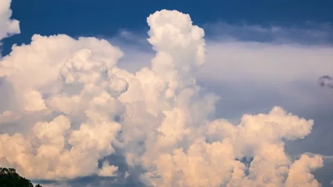 Timelapse - Massive rain clouds forming in the blue sky Video stock 134159853