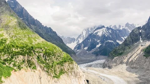 Timelapse of Mer de Glace glacier and Grandes Jorasses in the Mont Blanc massif  Stock Footage 65476132