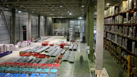 Timelapse of metal racks assembling for goods in warehouse Stock Footage 205684538