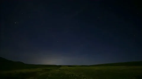 Timelapse of a Meteor Shower and Dazzling Starry Night Sky Over Rural China Stock Footage 337442271