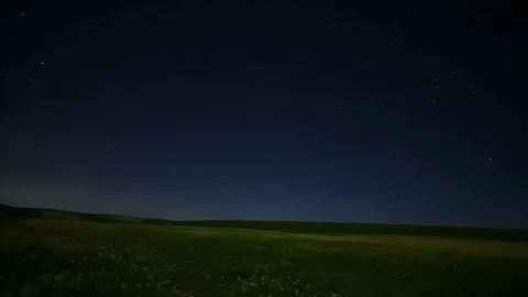Timelapse of Meteors Streaking Across the Starry Night Sky Over Rural China Stock Footage 337913553