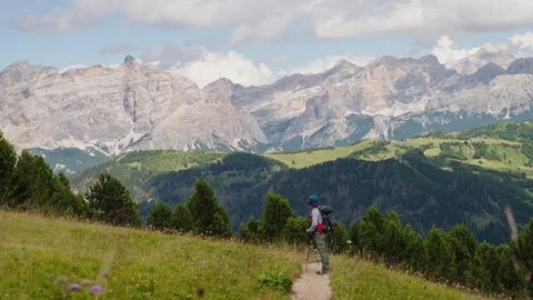 Timelapse middle-aged Asian group hikers hike trekking italian Dolomites mo.. Stock Footage 336229118