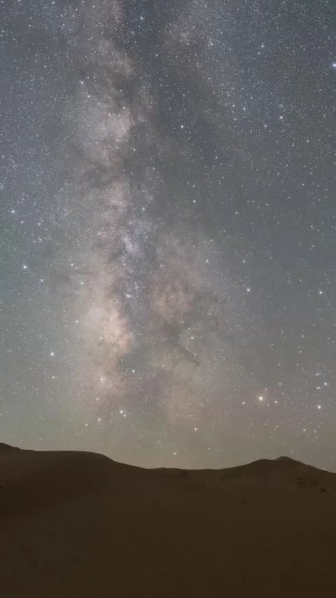 Timelapse of Milky Way over Tengger Desert dunes at night Stock Footage 345367138