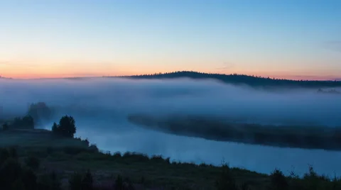 Timelapse of mist rises over the wild river. The sun had not yet risen 스톡 동영상 65123328