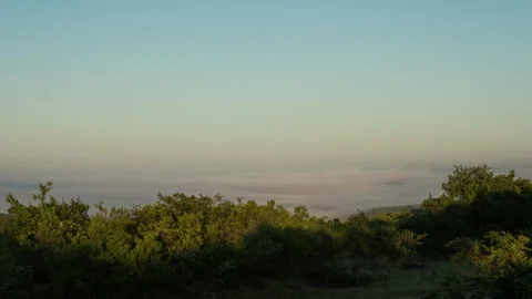 Timelapse Of Mist Rolling And Moon Setting Stock Footage 153247005
