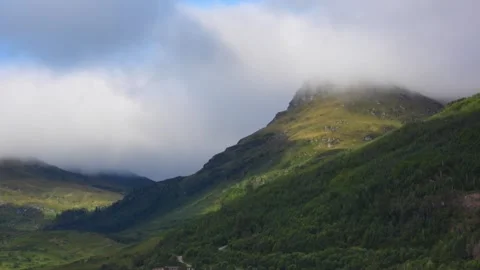 Timelapse of a Misty Green Mountain Valley Stock Footage 340131706