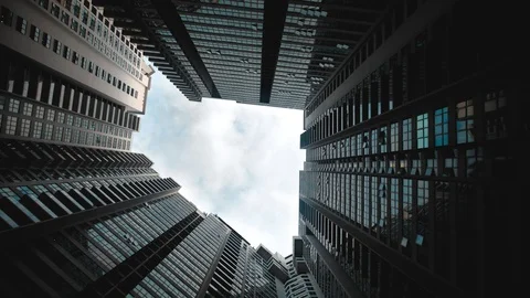Timelapse of modern architecture building with blue cloudy sky, abstract low Stock-Footage 127046857