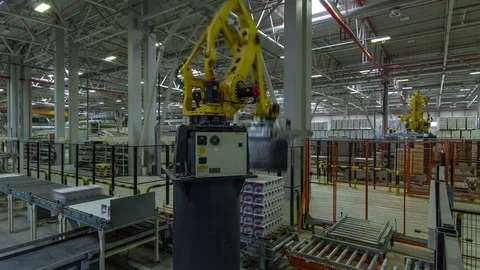 Timelapse Modern Machine with Mechanical Arm Packs Blocks Stock Footage 73554251