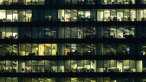 Timelapse. modern office building in the evening. windows. close-up Stock Footage 129848003