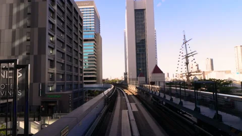 Timelapse of Monorail train making stop in Tokyo Metropolitan area  Stock-Footage 196476968