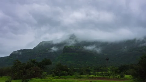 Timelapse - Monsoon storm coluds over a mountain 4K30 Stock Footage 270894537