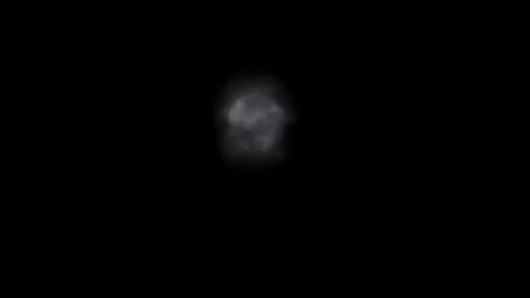 Timelapse of the moon covered in dramatic dark clouds Stock Footage 291528264