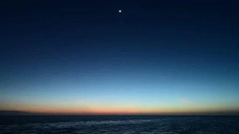 Timelapse of Moon, Jupiter and Venus setting over Gulf of Mexico off Cape Sable. Stock Footage 234367522