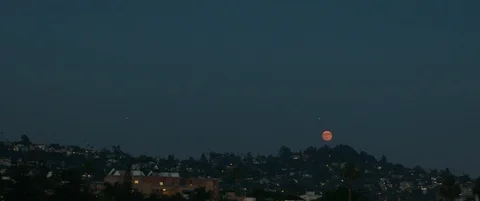 TIMELAPSE OF MOON OVER LA NIGHT VIEW Stock Footage 127469160