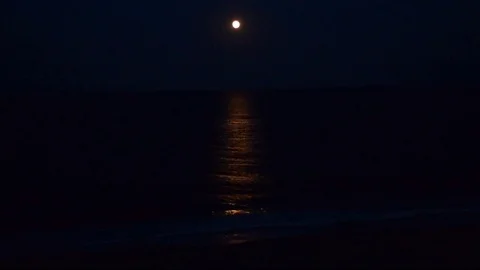 Timelapse of Moon over the Ocean at Night Stock Footage 82042710