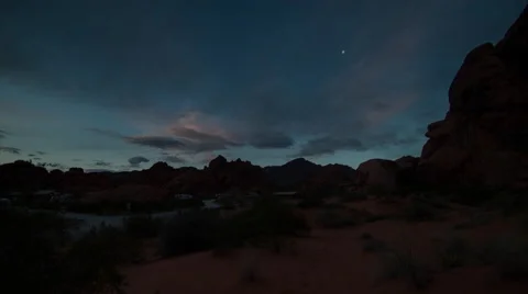 Timelapse of morning clouds over desert campground in NV Stock Footage 62632643