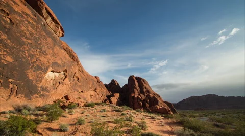 Timelapse morning clouds over desert cliff at sunrise Stock Footage 62632827