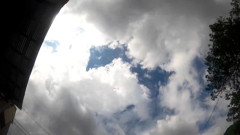 Timelapse of Morning Clouds Over Suburban Home Stock Footage 285720848