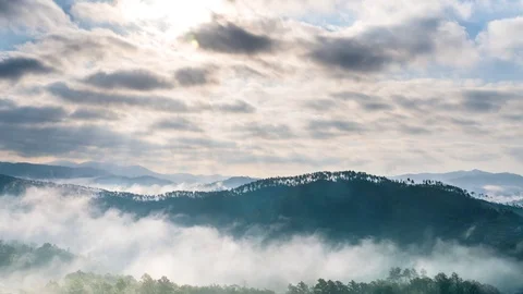 Timelapse. Morning mist go down on the amazing green mountains of Tuscany, Italy Stock Footage