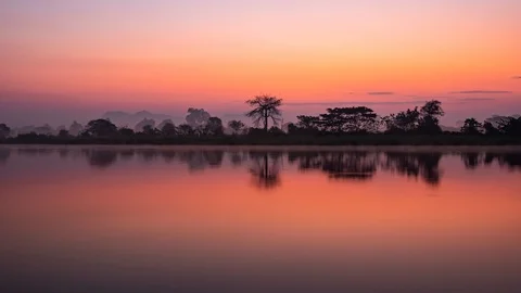 Timelapse of morning mist with reflection on the river Stock Footage 103449747